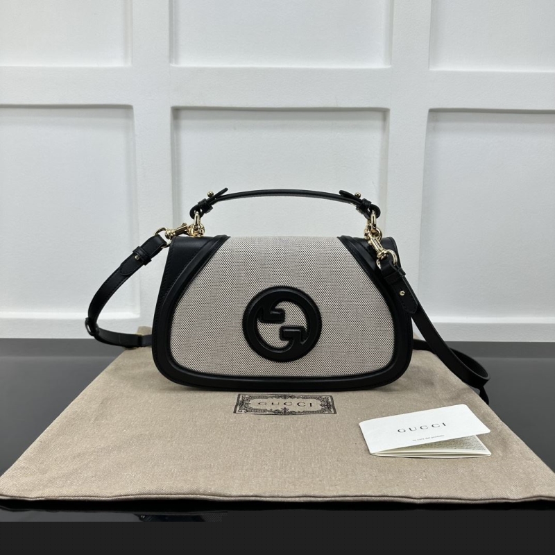 G*u*i top handle bags